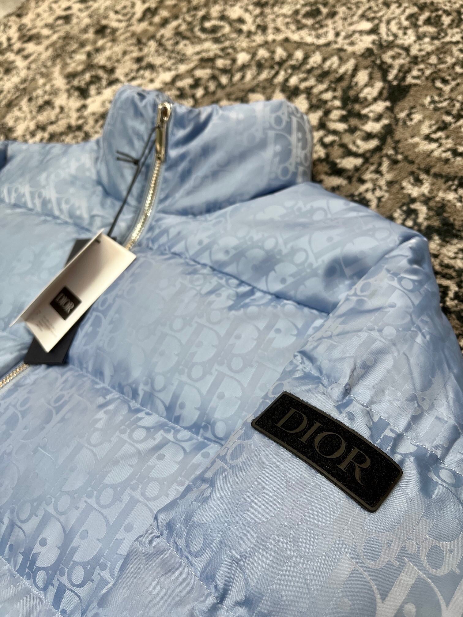 Doudoune CD oblique bleu ciel facture 2023