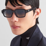 Lunettes de soleil avec logo Prada