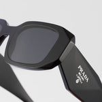 Lunettes de soleil Prada Symbole